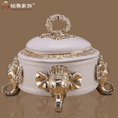 China Environmentally Friendly Wedding Decoration Gifts Four Elephant Heads Round Resin Jewelry Box for sale