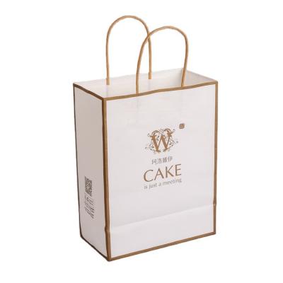 China Recycled Materials High End Takeaway Package Bags Kraft Paper Boutique Cute Paper Shopping Bag for sale