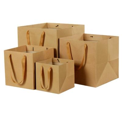 China Bouquet Paper Bag Square Base Recyclable Good Quality Kraft Paper Advertising Hard Bag for sale