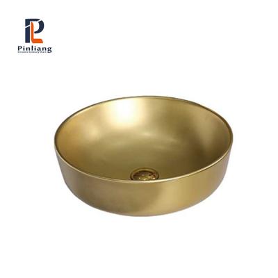 China Modern Luxury Matte Round Scratch Proof Art Wash Basin Bathroom Sinks Ceramic Gold Hand Wash Basin For Hotel for sale