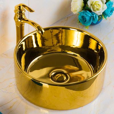 China Easy Clean Vessel Gold Luxury Gold Ceramic Sink Round Basin Bathroom Basin Bathroom Basin Sinks for sale