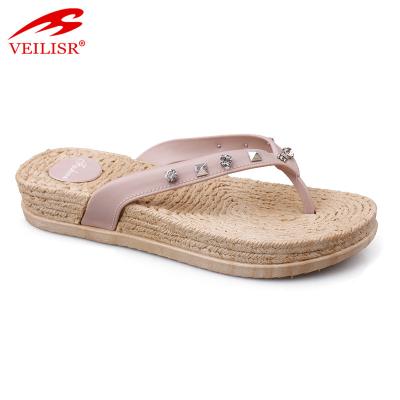 China Size Increasing Rivet Design T Strap Ladies PVC Slippers Wholesale Women Flip Flops for sale