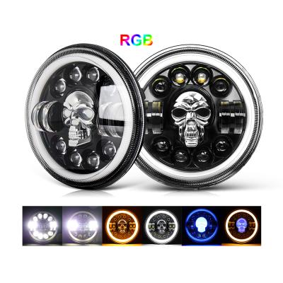 China Dot E9 Skull RGB LED Lamp Diecast Aluminum Housing Super Bright Angle Eyes 7 Inch LED Headlights Halo Ring DRL Round Motorcycle For Cowboy JK for sale