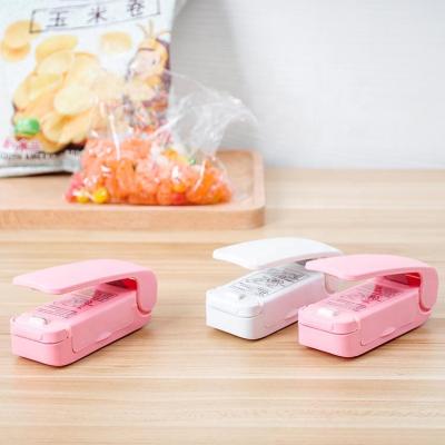 China Portable Food Mini Snack Plastic Bag Sealing Machine Travel Manual Pressure Heat Sealing Machine for sale