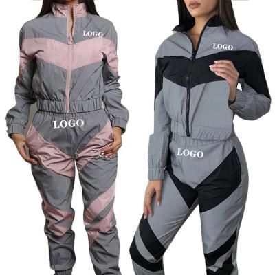 China Fashionable Women Breathable Sports Suit Reflective Lightweight Jacket With Zipper Active Loosd Plus Size Wear 2pcs for sale