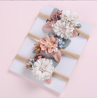 China Top Selling Environment Friendly Fabric Art Artificial Flowers Baby Headband For Girls for sale