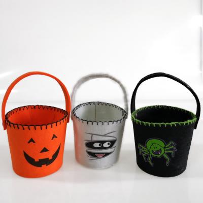 China Small Colorful Nonwoven Wholesale Halloween Candy Bags Trick and Treat Tote Buckets for sale