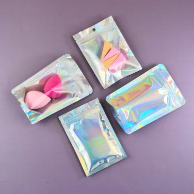 China Reusable Ziplock Top Barrier Laser Storage Bags Holographic Packaging Bags Storage Bag For Food Storage for sale