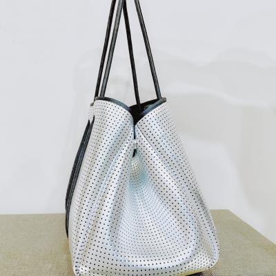 China Fashion Perforated Large Neoprene Beach Tote Silver Metallic Bag With Wristband Women Shoulder Bag For Beach for sale