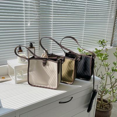 China 2022 New Fashion Women's Canvas Shoulder Bag Women's Waterproof Handbag With Small Pocket for sale