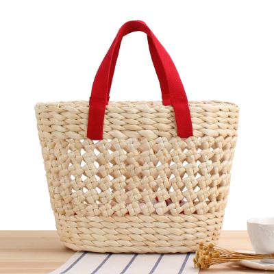 China Joker Style 2021 New Style Women Travel Beach Tote Summer Corn Bran Handmade Ladies Bag Straw Bag for sale