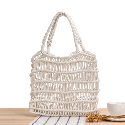 China 2021 New Style Joker Straw Woven Shoulder Bag Cotton Handwoven Net Rope Beach Handbag Bag Hot Summer Handwoven Bag for sale