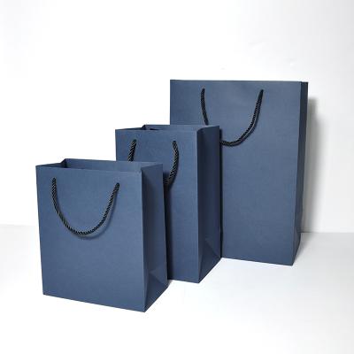 China shoes & clothing recycled custom paper cardboard clothing and shoes packaging paper bags with you own logo for sale