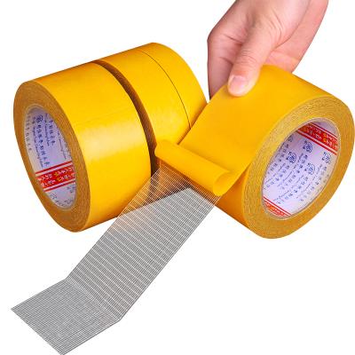 China Double Sided Filament Waterproof Adhesive Tape Transparent Extreme Double Sided Fiberglass Reinforced Cross Strapping Tape for sale