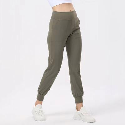 China Breathable Loose Joggers Harem Pants With Pockets Loose Casual Jogging Sweatpants Women Waist Pants Workout Highs for sale