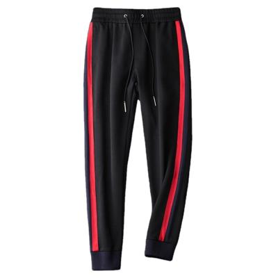 China Jogging Sustainable Fitness High Quality Polyester Sustainable Side Zipper Stripe Tracksuit Custom Training Tracksuits for sale