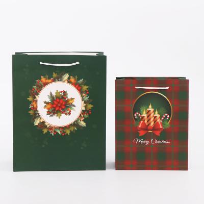 China Recyclable Christmas Theme Shape Gift Paper Bag Envelope Silk Handle Gift Gold Foiled White Card Paper Bag for sale