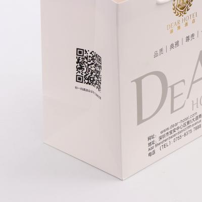 China Logo Printing White Cardboard Black Recyclable Custom Cardboard Paper Bags Luxury Kraft Paper Gift Packaging Bag for sale