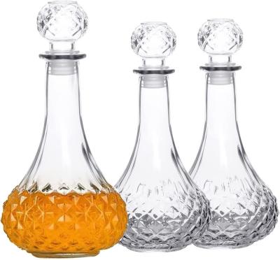 China Popular Single Round Embossed Glass Wine Decanter Glass Decanter for Ice Wine Wodka Vodka Whiskey for sale