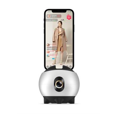 China Smart Mobile Phone 360 ​​Rotation Follow Camera Phone Holder Face Tracking Automatic Rotation Tracking Stabilizer for sale