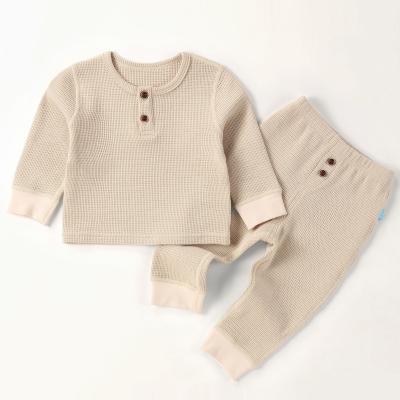 China Spring Antibacterial Autumn European Style Plain Color Waffle Cotton Knit Baby Clothes 2 Piece Set for sale