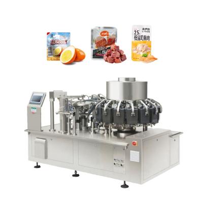 China Food Industrial Automatic Food Sachet Filling And Sealing Machine Fish Meat Vacuum Packing Machines for sale