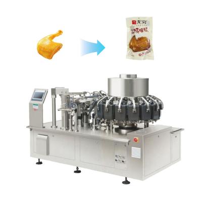 China Food Automatic Thermoforming Vacuum Packing Machine Rotary Premade Bag Machinery Sachet Packaging for sale