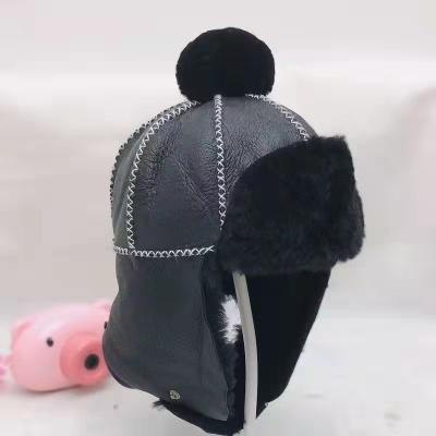 China Factory direct sales of the COMMON children's warm hat thick wool fur ear cap high quality protective windproof hat for sale