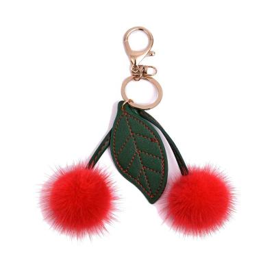 China Big Fur Ball Cherry Fur Mink Style Pendant Eco-friendly Korean Gift Bag Hanging Ladies Car Pendant Key Chain for sale