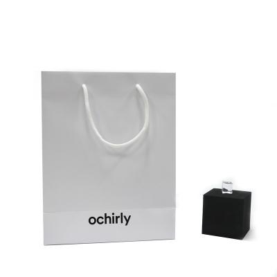 China Wholesale Recyclable Luxury White Shoes Clothes Kraft Paper Bags Printed Custom Logo Packaging Paper Bag Clothing Shopping Gift Jewelry for sale