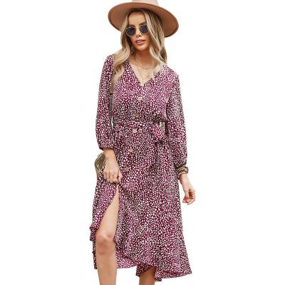 China 2021 Anti-wrinkle fashion autumn and winter V-neck floral long dresses stand alone leisure vacation wind for sale