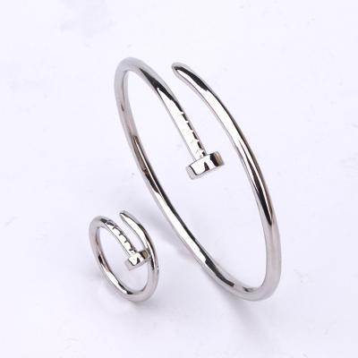 China Fashion Trendy Mens and Womens Bracelets Set Shiny Diamond Nail Bracelets Gold Plated Silver Jewelry Nail Ring Bracelet for sale