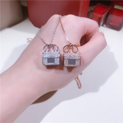 China FASHIONABLE Silver Custom Pendant Chain Necklace Stainless Steel Jewelry Gold Thin Layer Crystal Purse Necklaces Purse Necklaces for sale