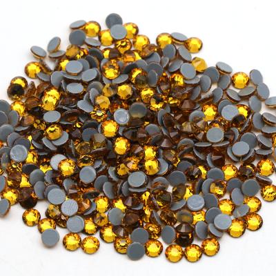 China Flatback Topaz Iron On Crystal Flat Back Hotfix Glass Rhinestones For Apparel Decor for sale