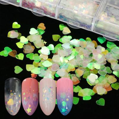 China 3d Nail Art Decoration DIY Glitter Colorful Nail Art Decoration Paillette Bead Flakes Heat Light Semi-Transparent Thin Sequins Star Light for sale