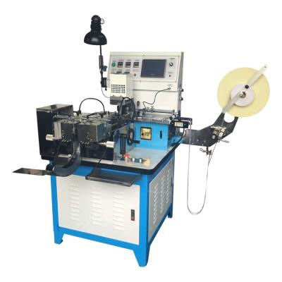 China Automatic Single Cutting Multi Functional Woven Label Cutting And Folding Machine for sale