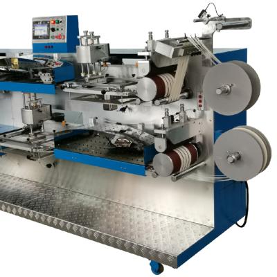 China Heat Transfer Roll Screen Printing Automatic Computer Controlled Care Label Screen Printing Machine 2021 for sale