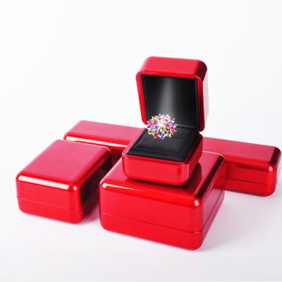 China Custom Cheap Manufacture Velvet Fashion Necklace Ring Luxury Plastic Jewelry Gift Packaging Box With Led Light For Bracelet for sale