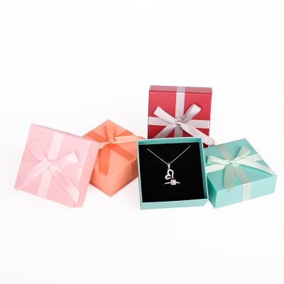 China 9x9cm Attractive Green Small Square Earrings Necklace Ring Necklace Jewelry Velvet Wrapping Paper Pink Orange Red Pink Boxes for sale