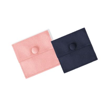 China Customized Attractive Deboss Logo Flapper Double Layer Jewelry Pouch Small Suede Microfiber Small Square Bags With Long Snap Button for sale