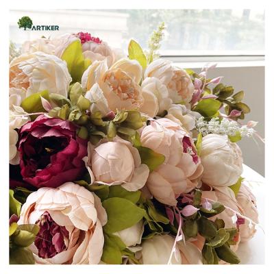 China Eco-friendly cheap artificial flowers many heads roses colorful silk bouquet for home decor fade bakerpure peony for sale