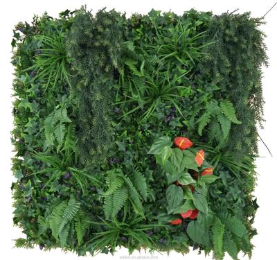 China Eco-friendly Green Leaves Wall Hanging Faux Wedding Grass For Balcony Backdrop Wall Paneling Hawaii Artificial Tropical Grass Wall for sale