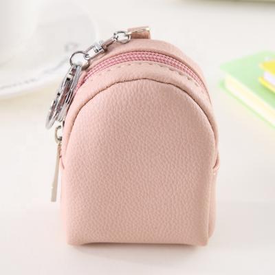 China New Fashion Mini Handbag Waterproof Luxury Creative PU Leather Lady Purse Small Round Coin Purse With Key Chain for sale