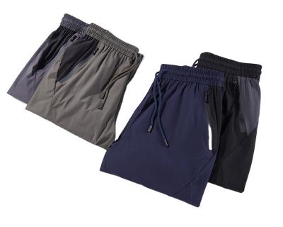 China Men's Running Sweatpants Simplification Sweat Absorption Anti-Wrinkle Breathable Workwear Workwear Pants for sale