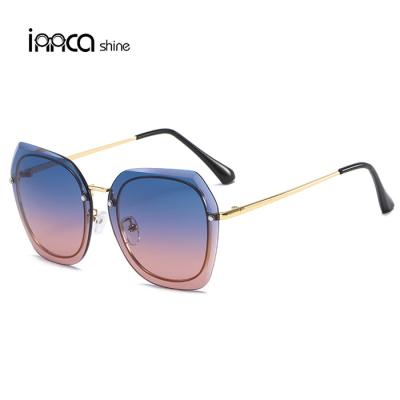 China Fashionable Girls Frameless Ladies Metal Eyewear Sunglasses Sun-shading Merchant Oversized Sunglasses for sale