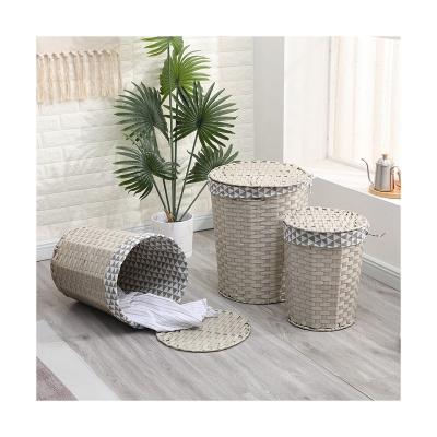 China Vintage Factory Supply Universal Portable Round Woven Rattan Storage Basket Laundry With Cover for sale