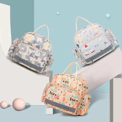 China Water Resistant Mini Baby Diaper Packing Bag Cute Printing Diaper Bags Mommy Diaper Bag Backpack Bag for sale