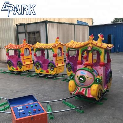 China New funny hardware kiddie ride on play machine EPARK fiberglass 14 seats kids electric track train for sale for sale