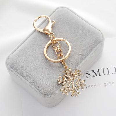 China European And American Popular Christmas Gift Snowflake Accessories Fashion Key Chain for sale