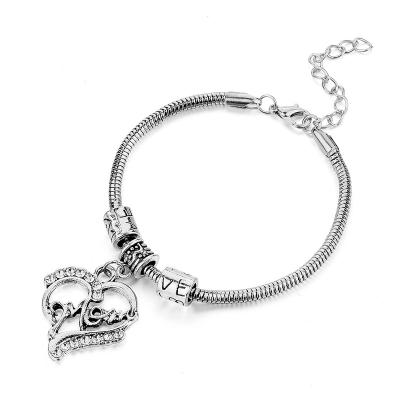 China Jewelry Casual / Sporty Gold Charm Chain Toggle Clasps Bracelet Rhinestone Heart Bracelet for sale